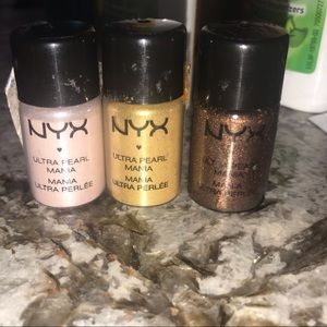 ULTRA PEARL MANIA BY NYX EYESHADOW LOOSE POWDER.